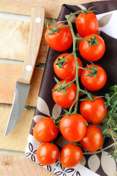 Tomatoes Cherry fresh ripe on a wooden board — Stock Photo, Image