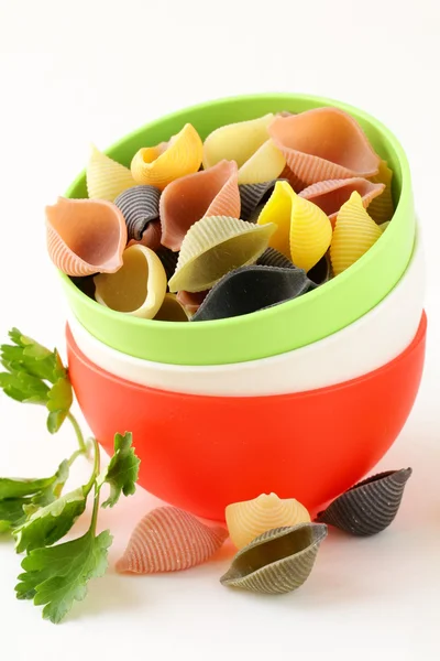 stock image Uncooked tricolor pasta in cups in the style of the Italian flag