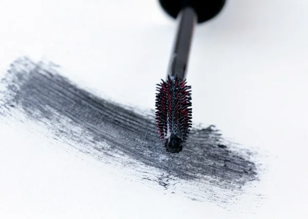 Brush with black mascara for makeup — Stock Photo, Image