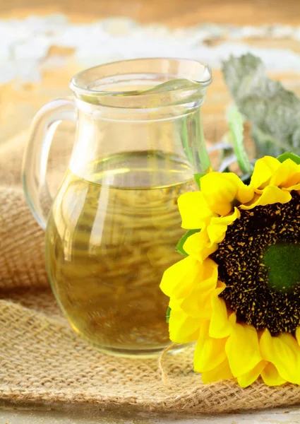 Sunflower oil from sunflower in a glass jar — Stock Photo, Image