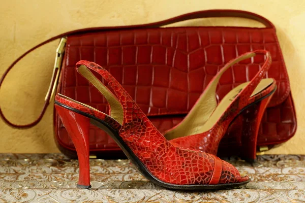 Fashion stylish red women's shoes at the glamorous background — Stock Photo, Image
