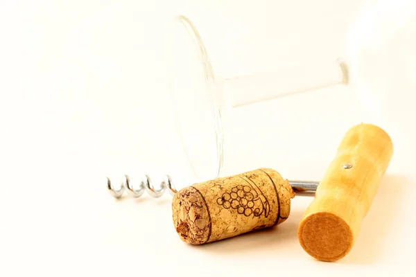 Cork from wine and a corkscrew on white background — Stock Photo, Image