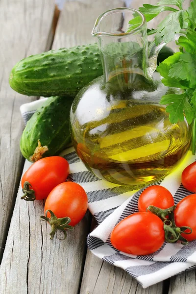 Cherry tomatoes, olive oil and parsley on wooden background — Stock Photo, Image