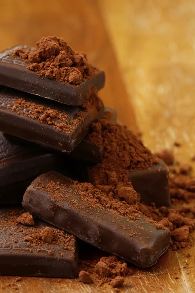 Csendélet csokoládé kakaó, csokoládé chips, cukorka — Stock Fotó