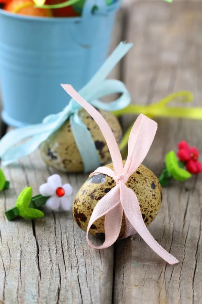 Easter quail eggs on wooden background — Stock Photo, Image