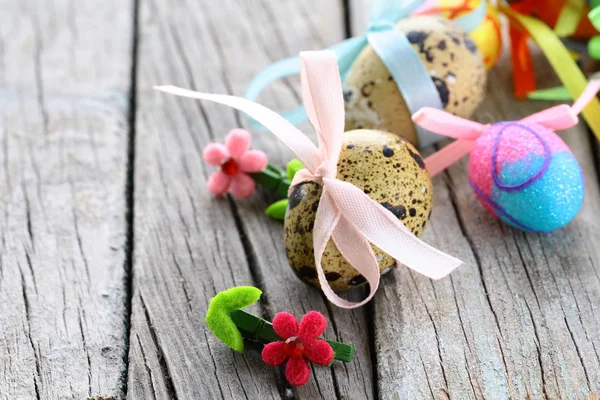 Easter quail eggs on wooden background — Stock Photo, Image