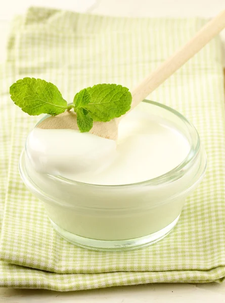 Fresh natural yoghurt in glass jar — Stock Photo, Image