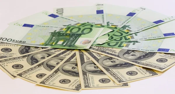 Cash in euro and US dollars — Stockfoto