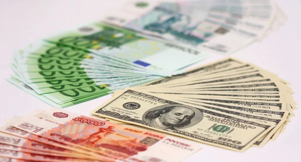 Efectivo en euros, rublo y dólares estadounidenses — Foto de Stock