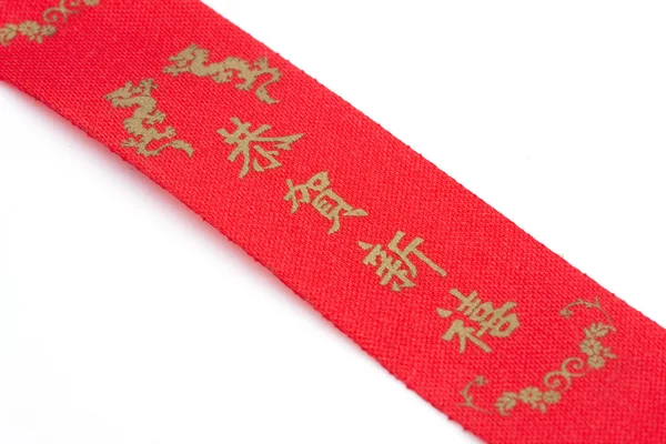 Röd rosett och kinesiska alfabetet — Stockfoto