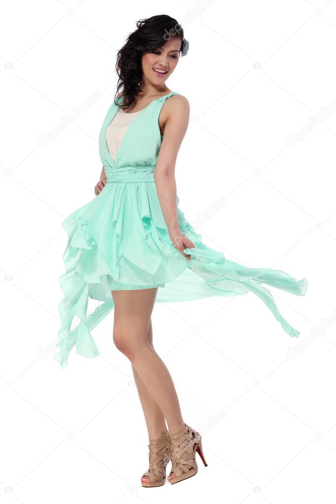Attractive young woman in stylish dress