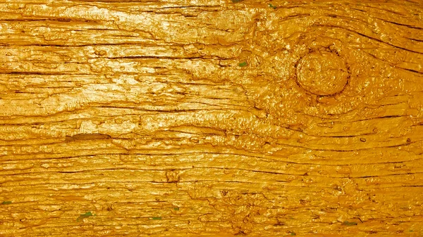 Wooden plank painted in golden — Stock Photo, Image