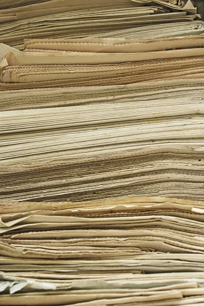 Stock image Stack of old newspapers