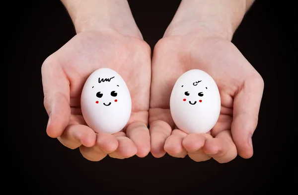 Αρσενικό χέρι εκμετάλλευση αστεία αυγά — Φωτογραφία Αρχείου