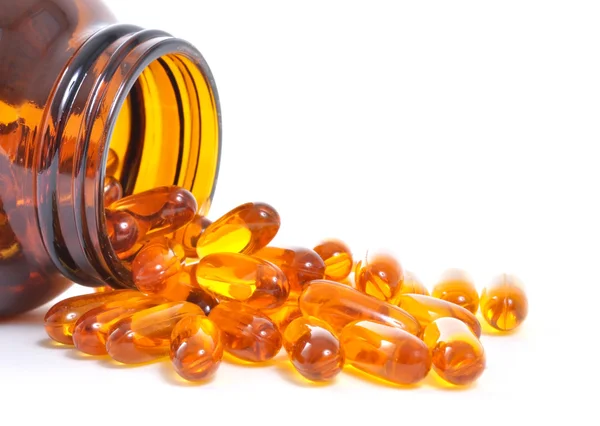 Fish oil capsules Royalty Free Stock Images