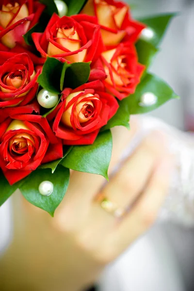 stock image Bride and groom holding bouquet