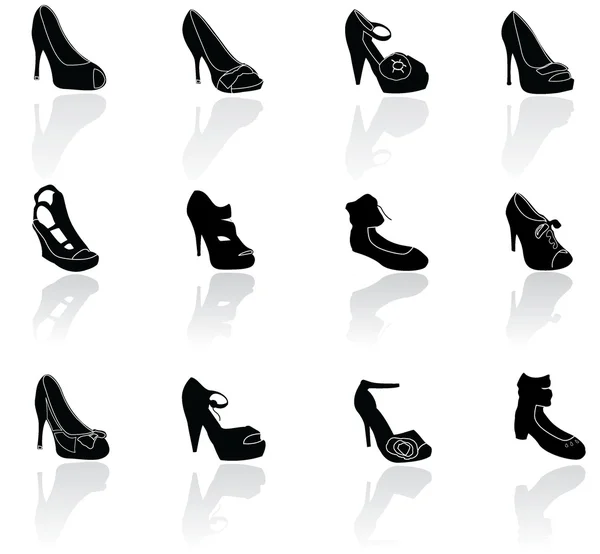 Schuhe Silhouetten Ikonen — Stockvektor