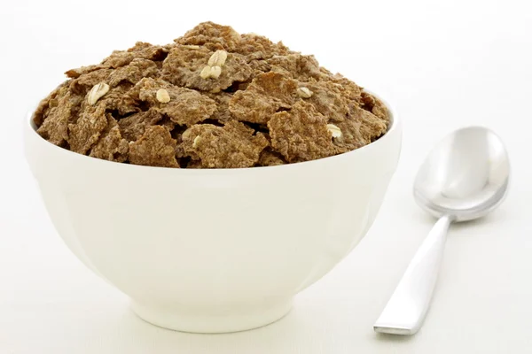 Wheat bran flakes cereal breakfast with rolled oats — Stock Photo, Image