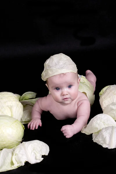 Baby in the cabbage — Stock Photo, Image