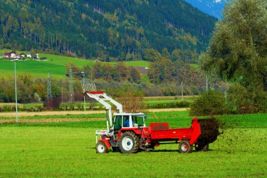 Tractor with a trailer clipart