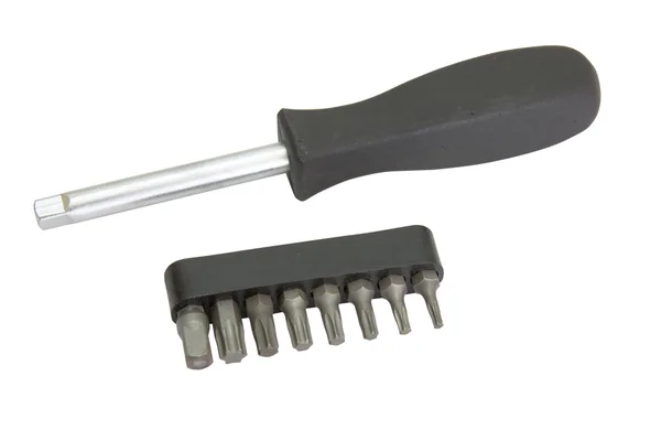Um conjunto de ferramentas e uma chave de fenda, isolado em fundo branco . — Fotografia de Stock