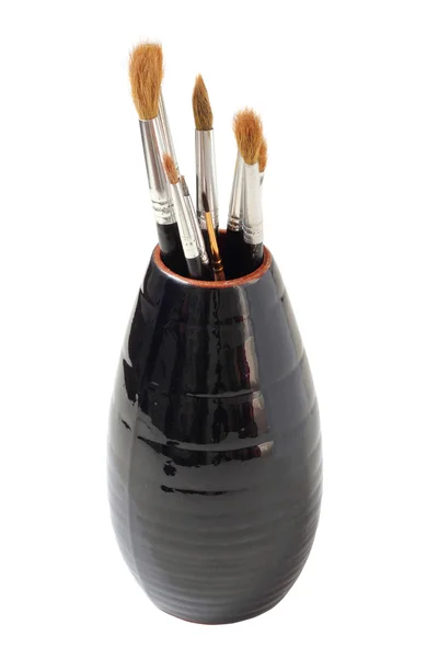 Vase with brushes of the artist — Stock Photo, Image