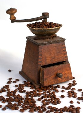 Old jug of coffee and coffee-grinders Retro clipart