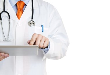 Doctor working on a digital tablet with copy space clipart