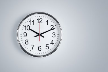 Silver clock at the wall clipart