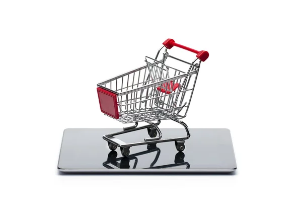 Shopping cart at digital tablet — Stock Photo, Image