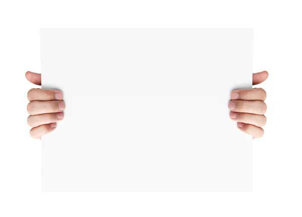 Mãos segurando cartão de publicidade em branco — Fotografia de Stock