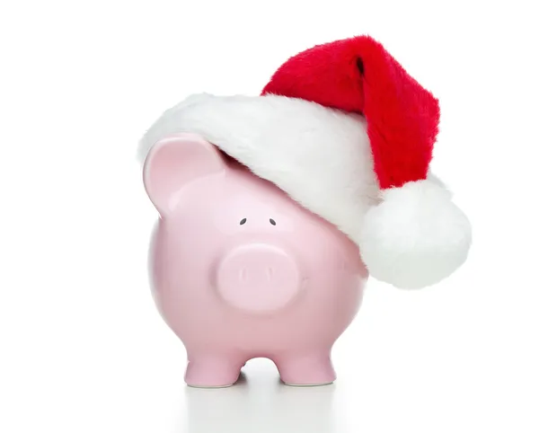 Sparschwein mit Weihnachtsmütze — Stockfoto