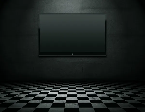 TV de tela plana em grunge interior vazio — Fotografia de Stock