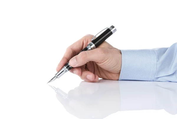 Human hand writing with silver pen — Stock Photo, Image