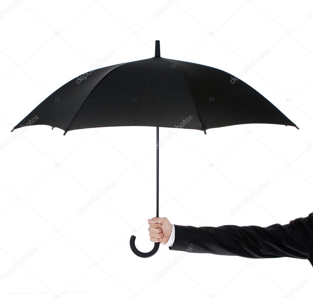 Open umbrella in human hand