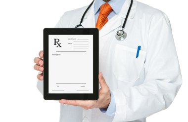 Doctor holding digital tablet with prescription on it clipart