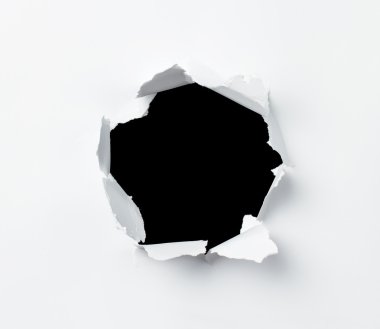Hole in paper sheet