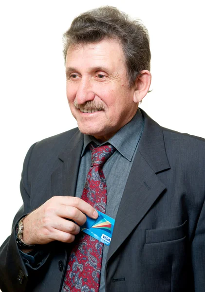 Biznesmen posiadania karty bankowej na białym tle — Zdjęcie stockowe