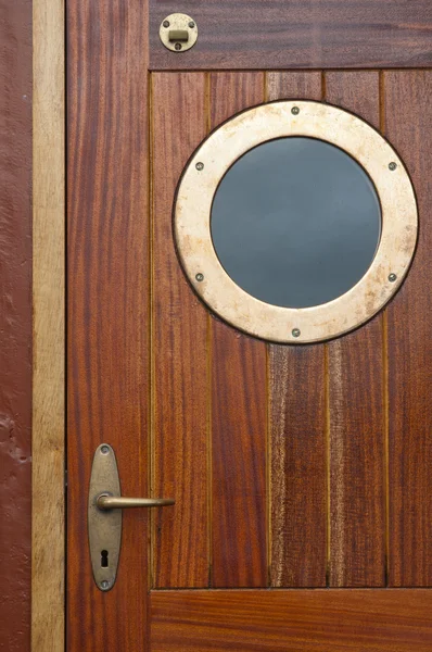 Old ship door with a window — Stock Photo, Image