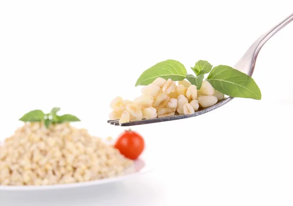 Forchetta con grano e basilico — Foto Stock