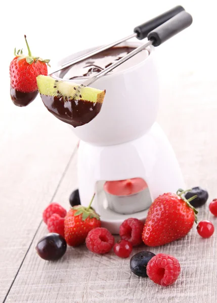 Chocolate fondue and fruits — Stock Photo, Image