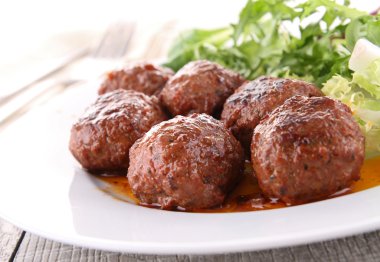 Roasted meatballs and vegetable clipart