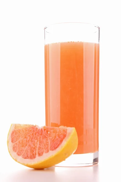 Изолированный грейпфрутовый сок — стоковое фото