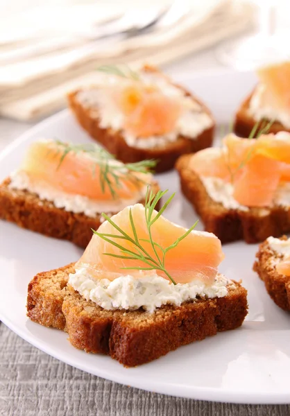 Gingerbread, cheese and salmon — Stock Photo, Image