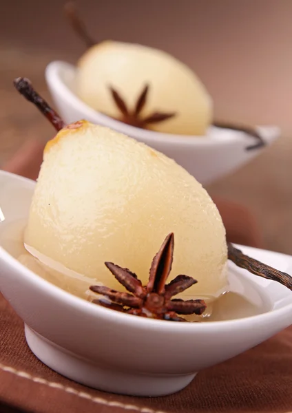 Poached pear and syrup — Stock Photo, Image