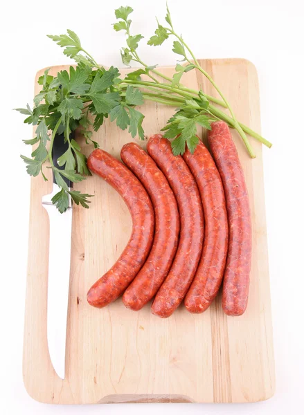 Saucisse crue et persil isolés — Photo