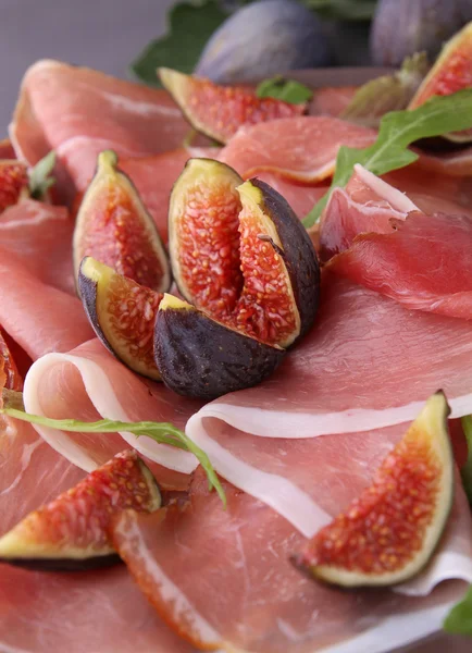 Prosciutto ham and fig — Stock Photo, Image