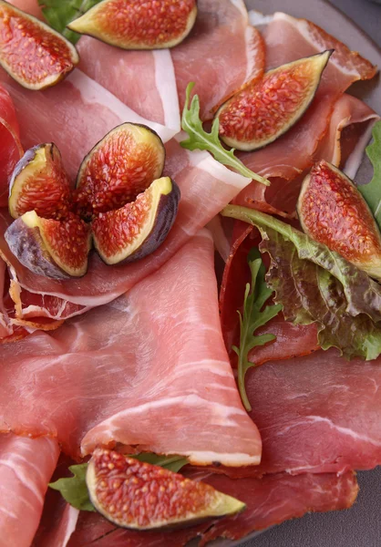 Prosciutto ham and fig — Stock Photo, Image