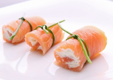 Appetizer, salmon roll with cheese clipart