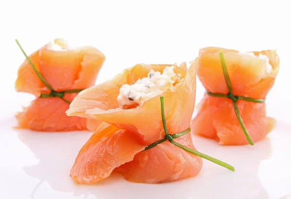 Salmon roll with cheese on white — Stock Photo, Image